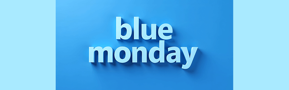 Illustration avec le texte "Blue Monday" sur fond bleu.