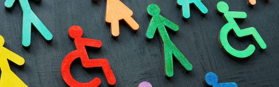 Illustration du handicap invisible avec des figurines colorées
